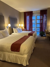 Spacious double queen room with 2 desks, drawers and ample closet.