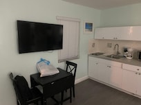 Smart Tv and kitchenette