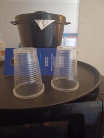 Uncovered cups not acceptable.