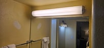Paint on light fixtures. Sloppy paint job