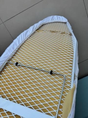 Broken and dirty ironing board