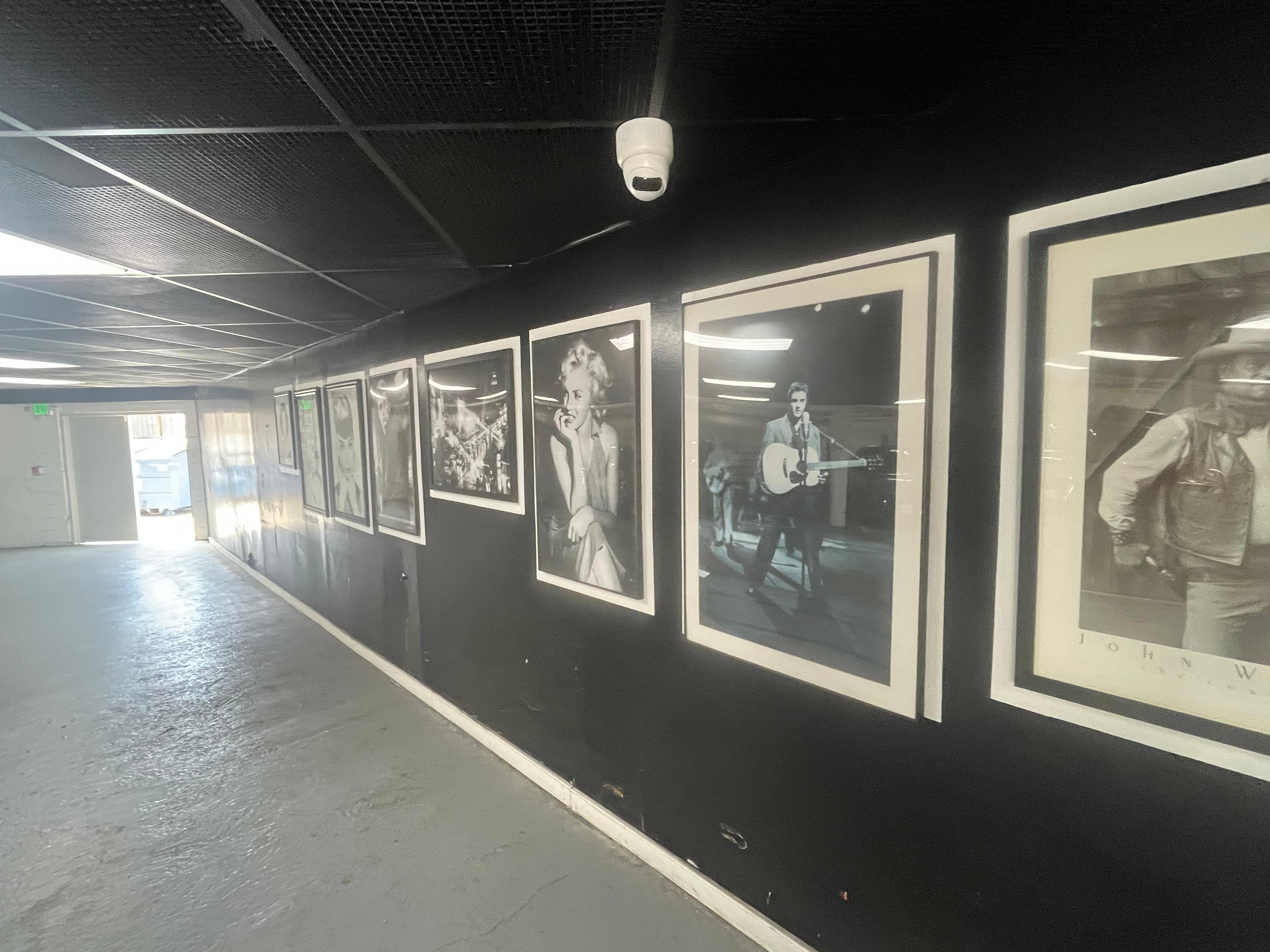 Hollywood photos in parking garage — an elegant touch. 