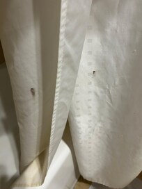 Stain on shower curtains