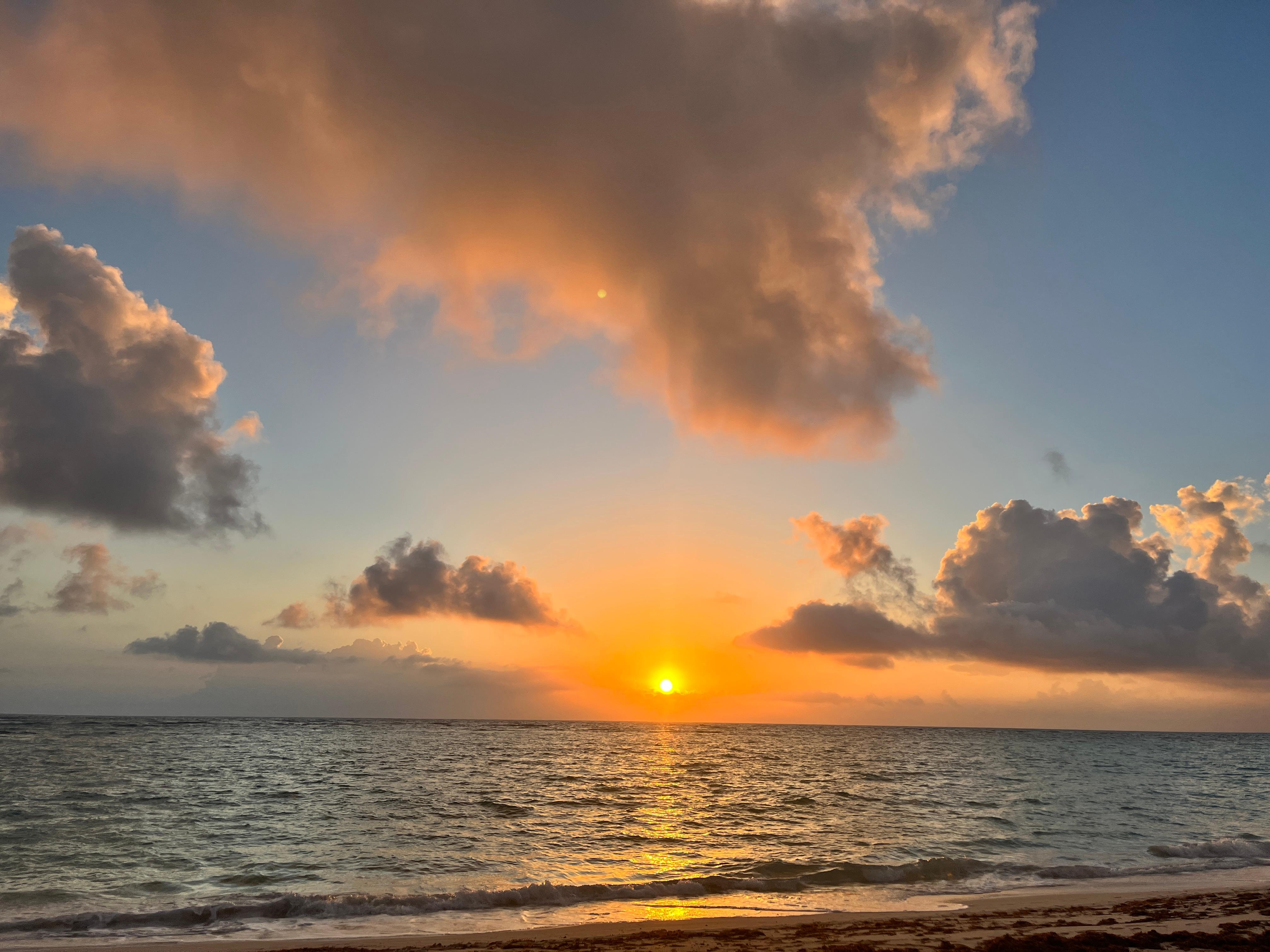 Beautiful morning watching the sunset rise from the beach.