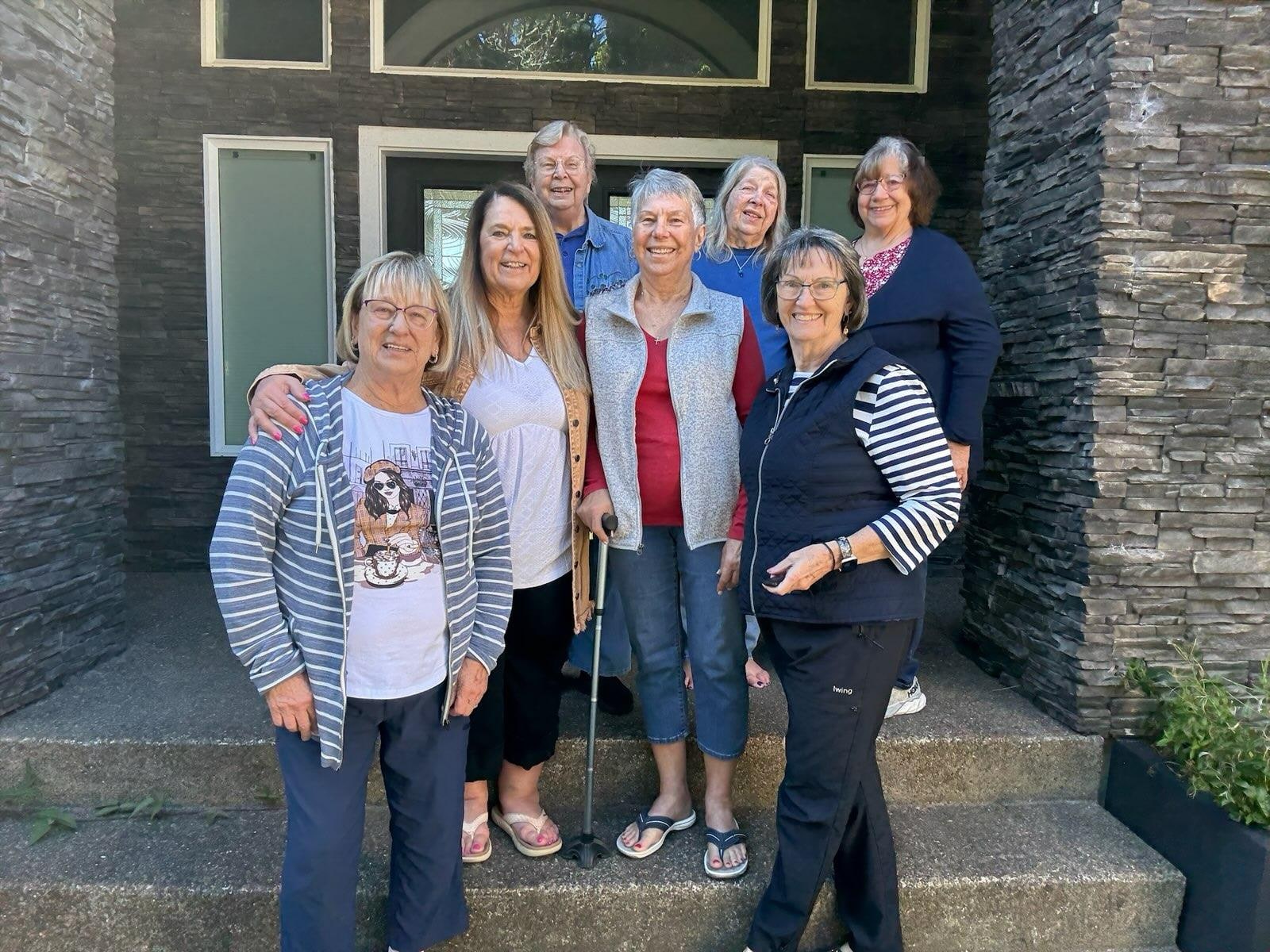 In front of the beautiful home