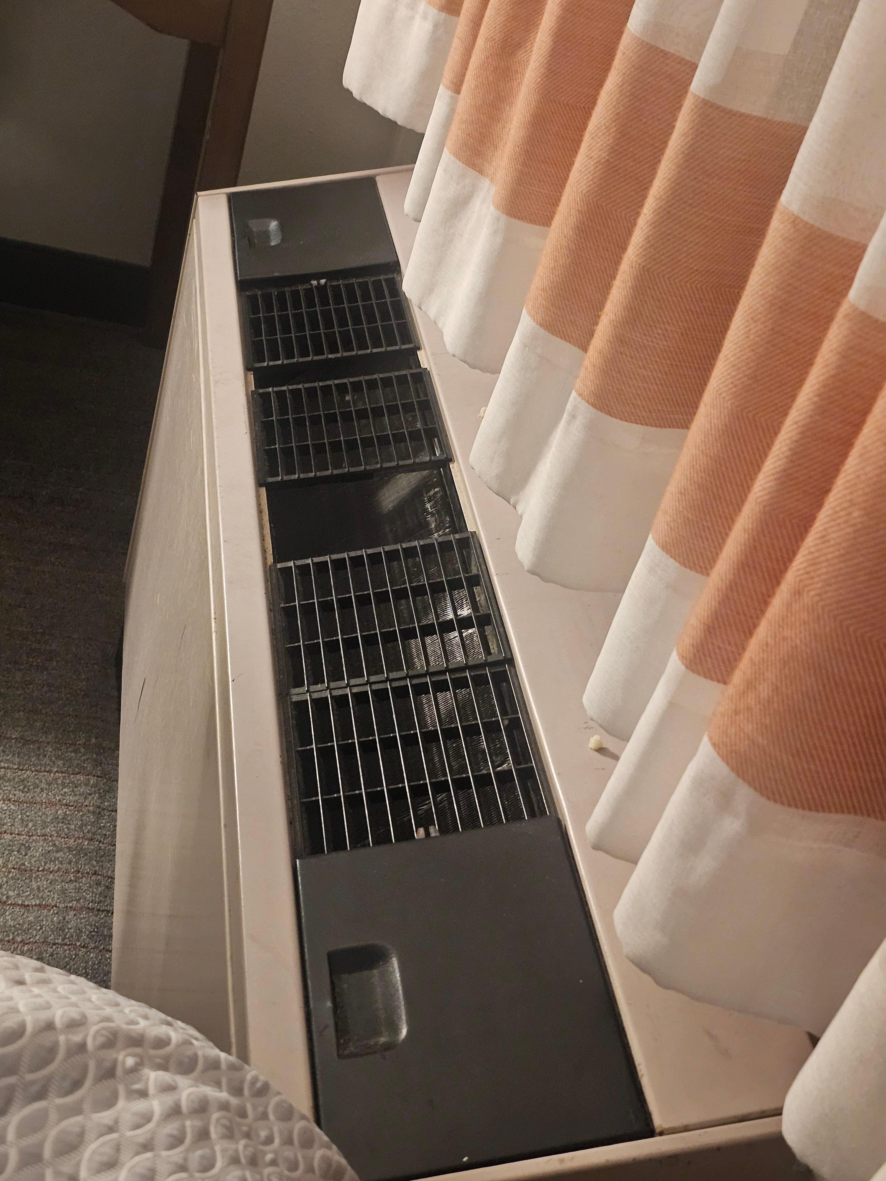 ac / heater fire hazard close to the bed and missing screen on top