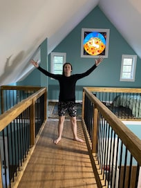 Granddaughter on sky bridge to sleeping loft