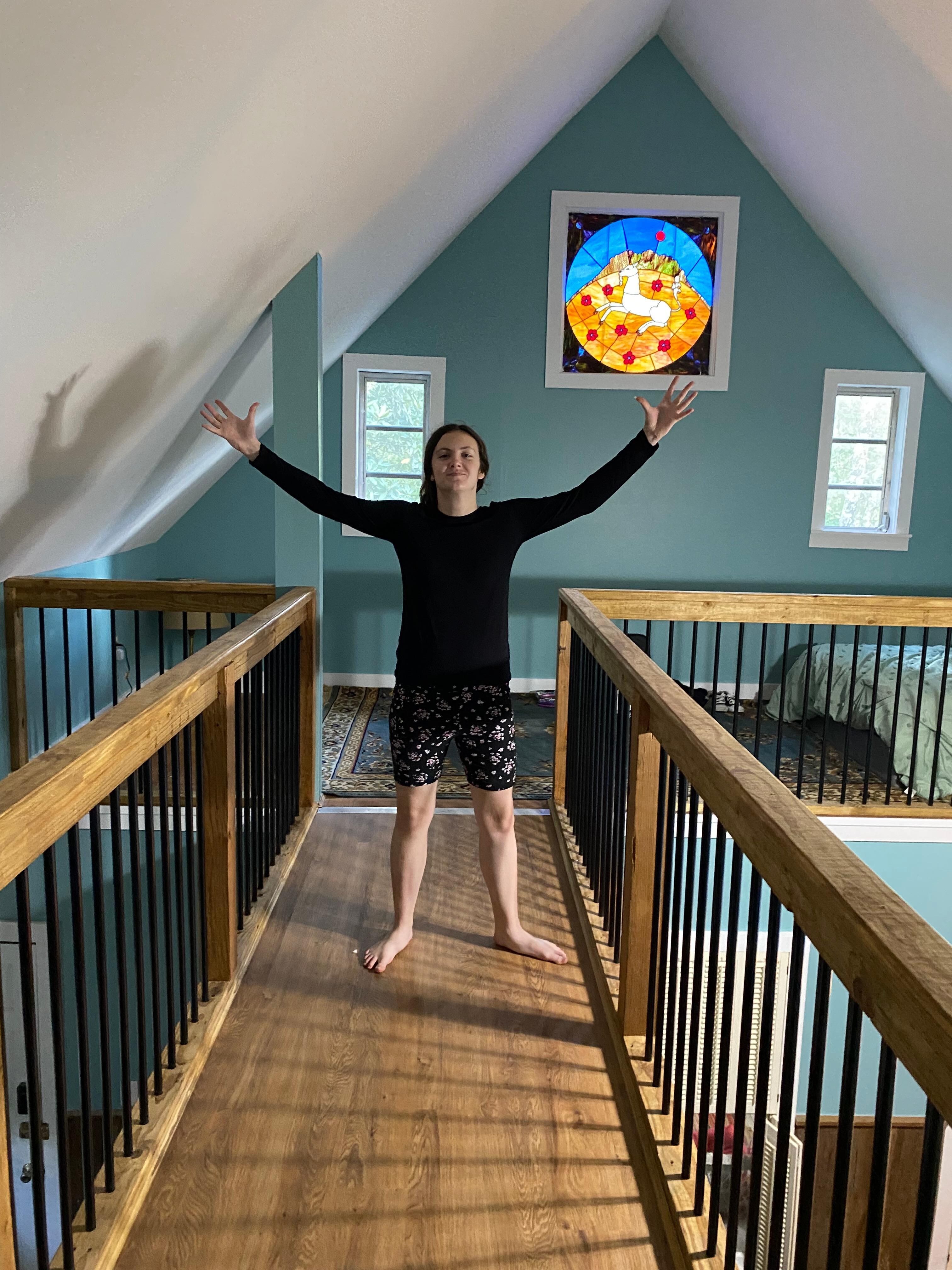 Granddaughter on sky bridge to sleeping loft