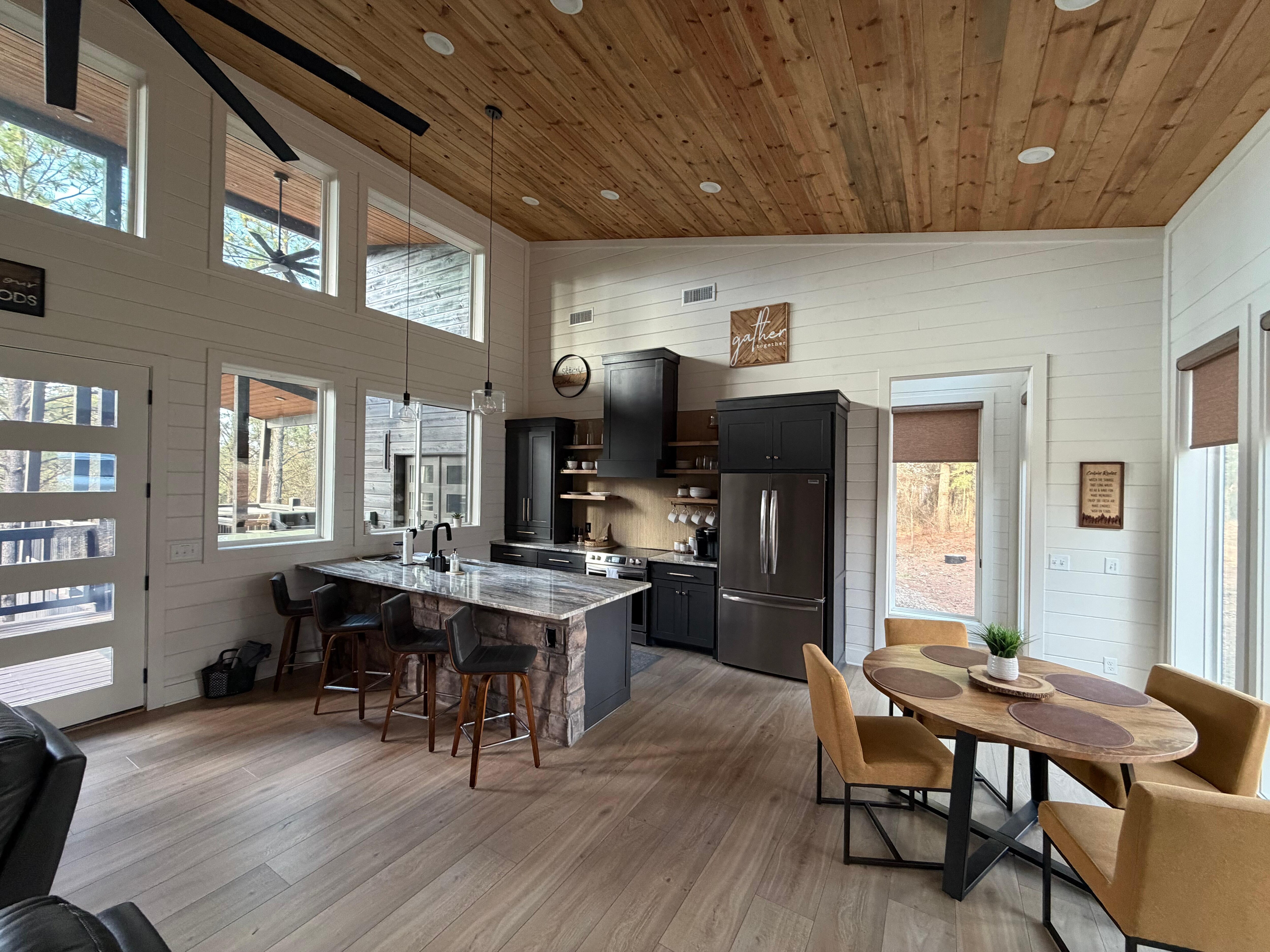 The kitchen is open  and a great gathering place. It is perfect for the start or finish to any day! 