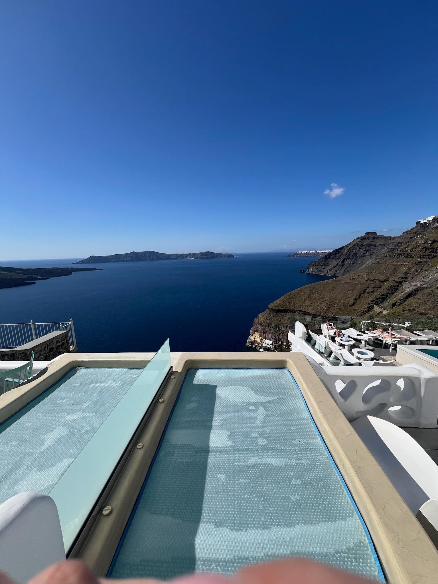 view from our patio showing outdoor hot. neighbors hot tub directly next to ours with some privacy 