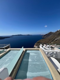 view from our patio showing outdoor hot. neighbors hot tub directly next to ours with some privacy