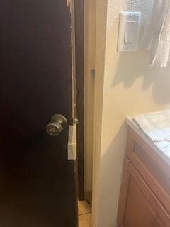 Door coming apart in master bathroom, they used tape to fix it