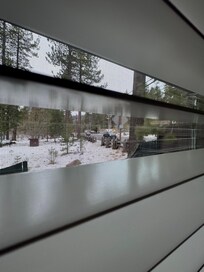 House is literally on the road . Extremely loud from the passing vehicles