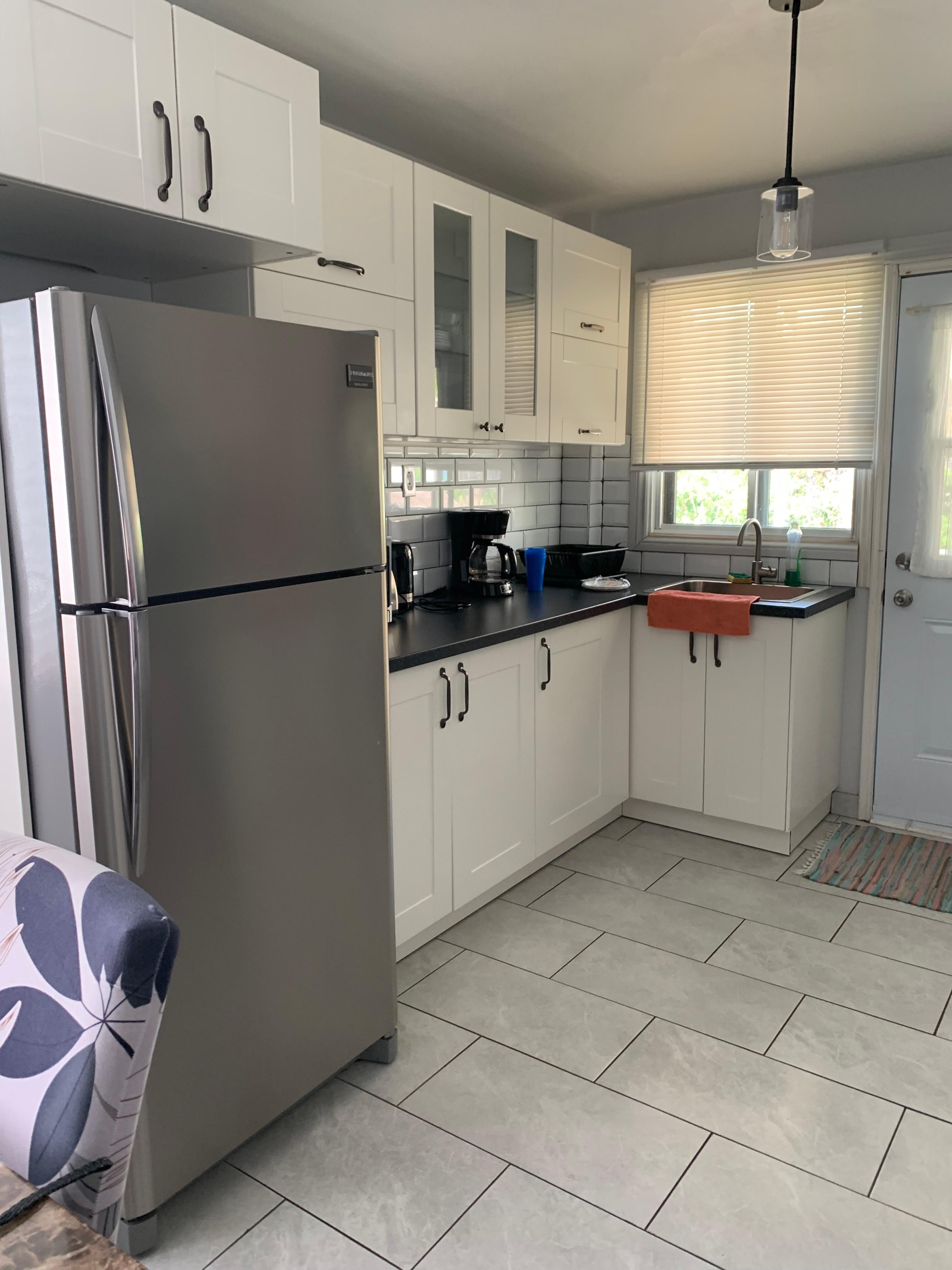 Clean bright kitchen (only think missing was a sink stopper)