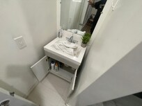 The bathroom sink area.