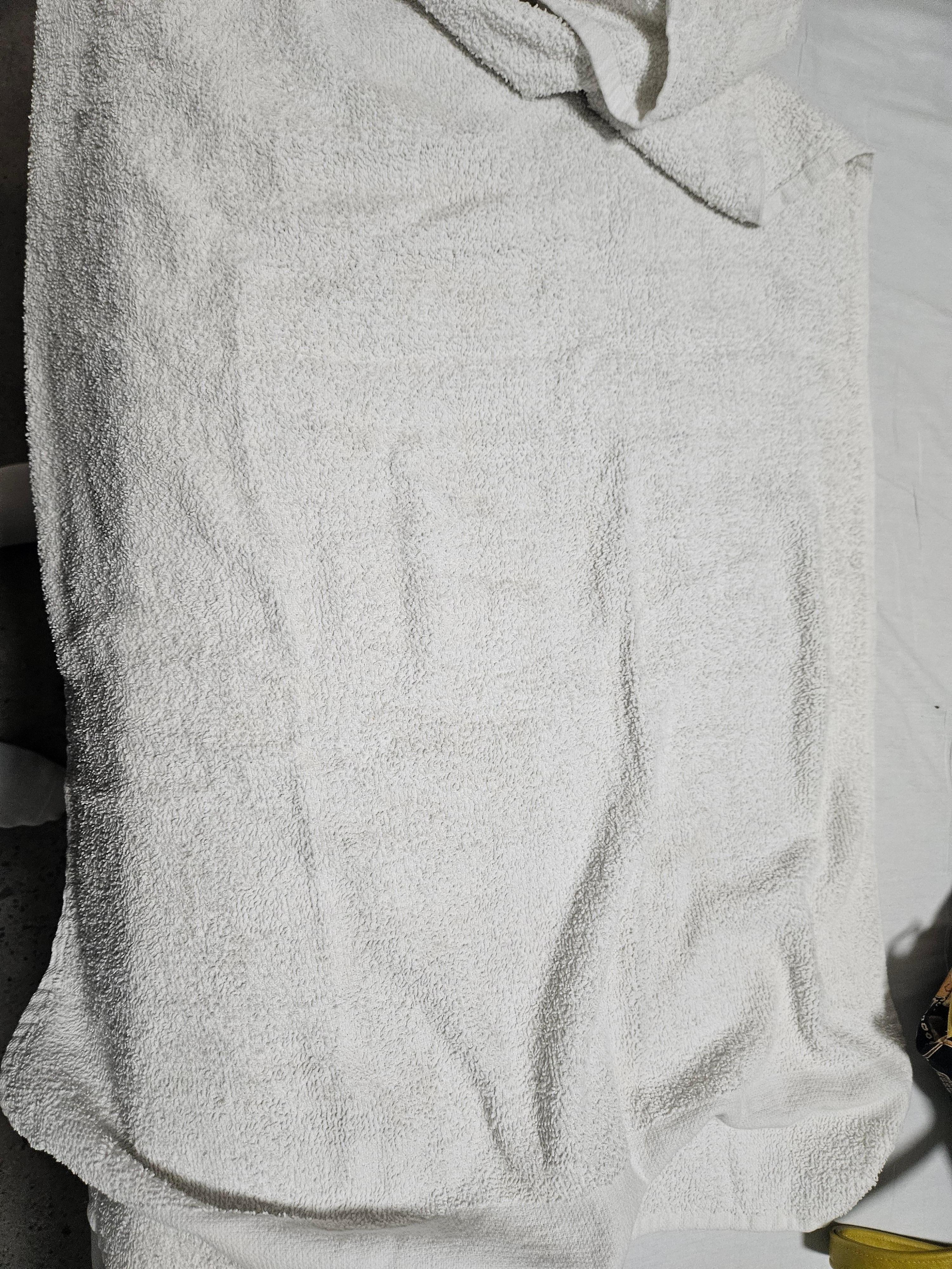 Thin well used towels.