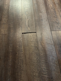 The flooring was sticking up and gapped all throughout the house.