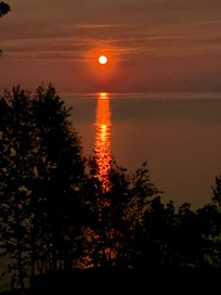 Orange moon rising on first night