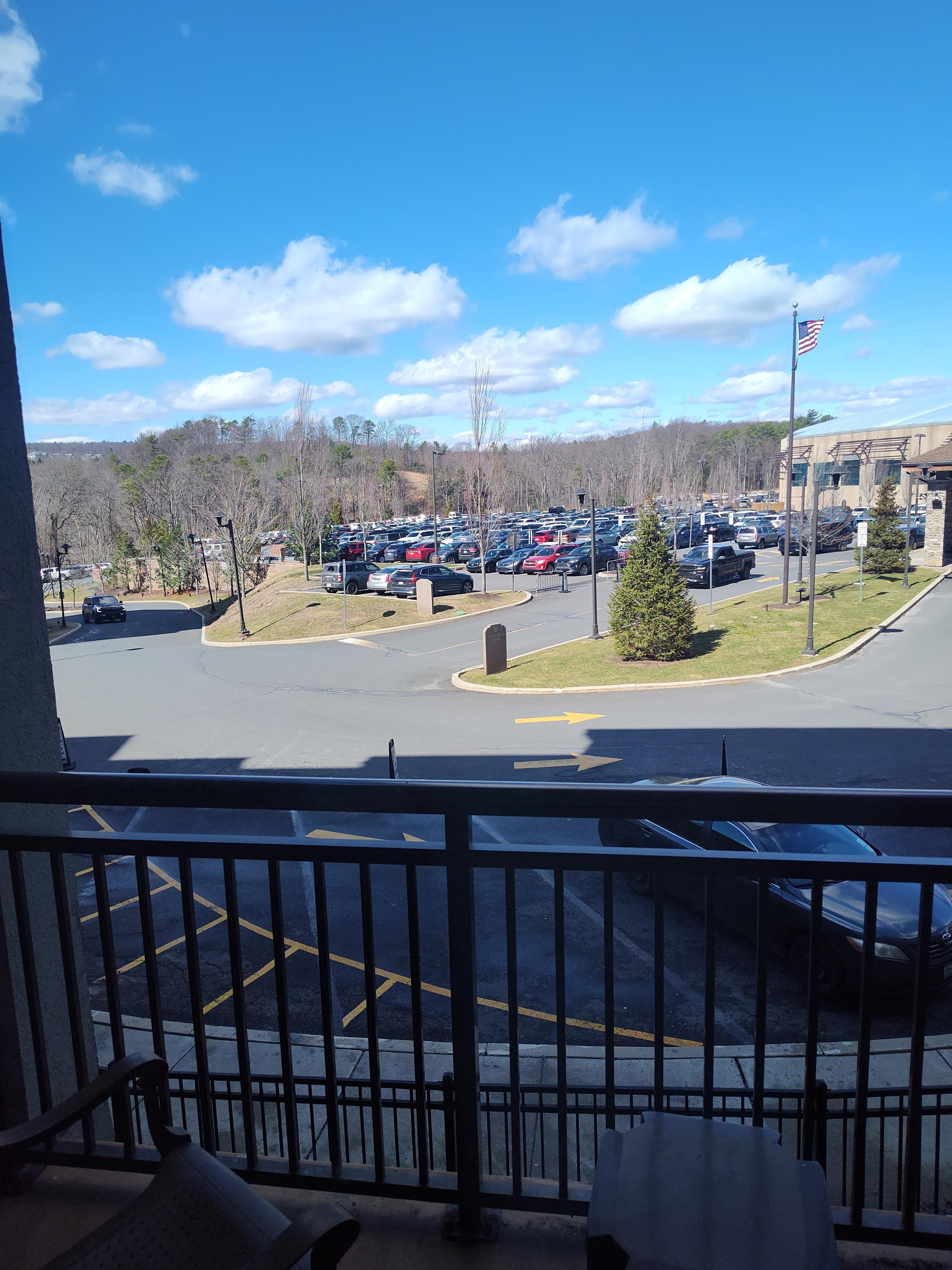 Balcony with a view of the parking lot (that I couldn't find room to park)