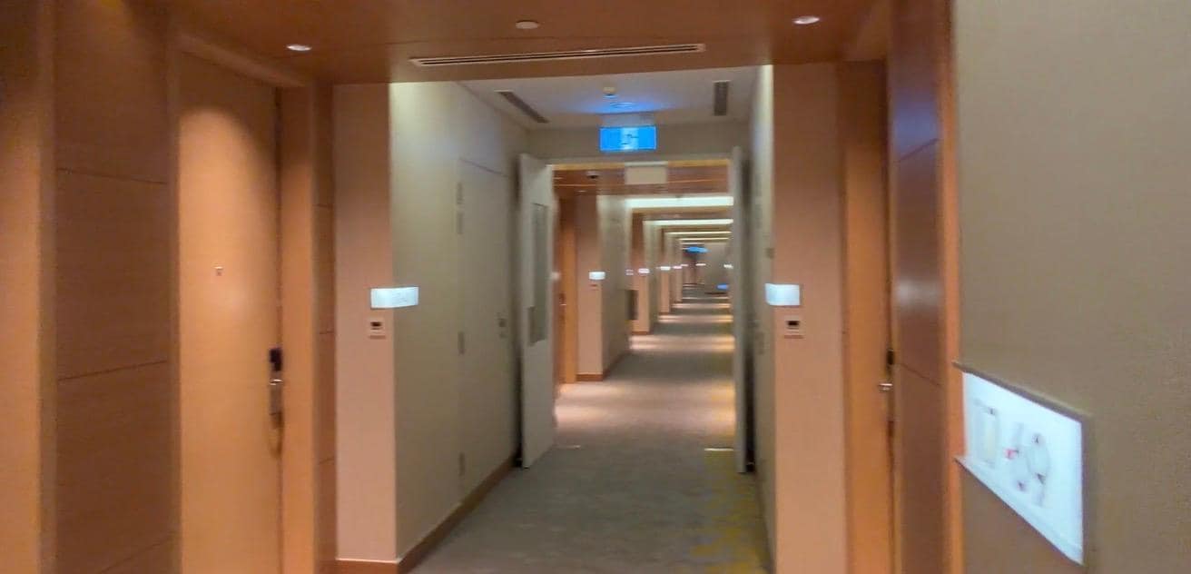 Well lit spotless hallway.