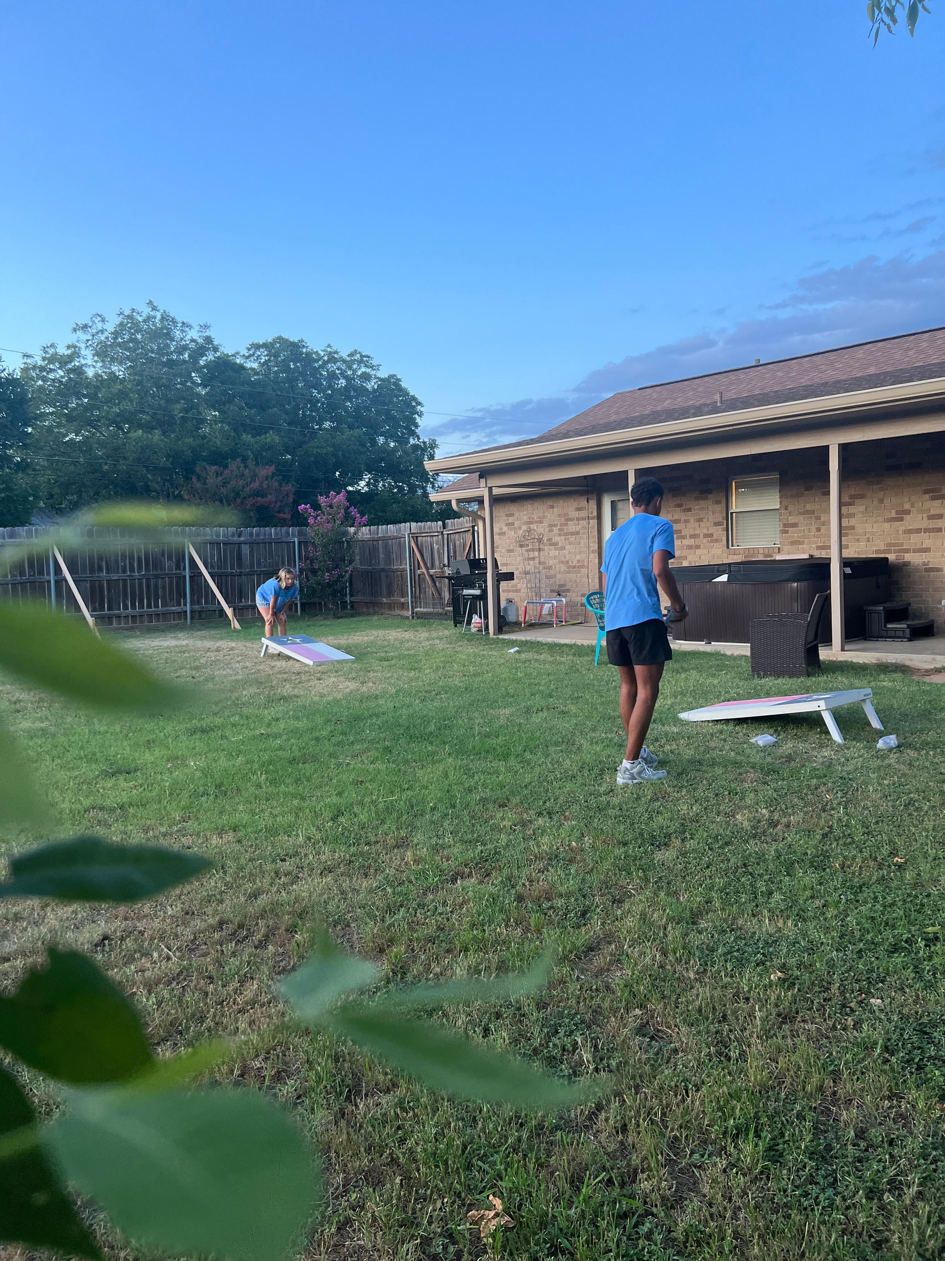 We loved playing cornhole in the backyard.