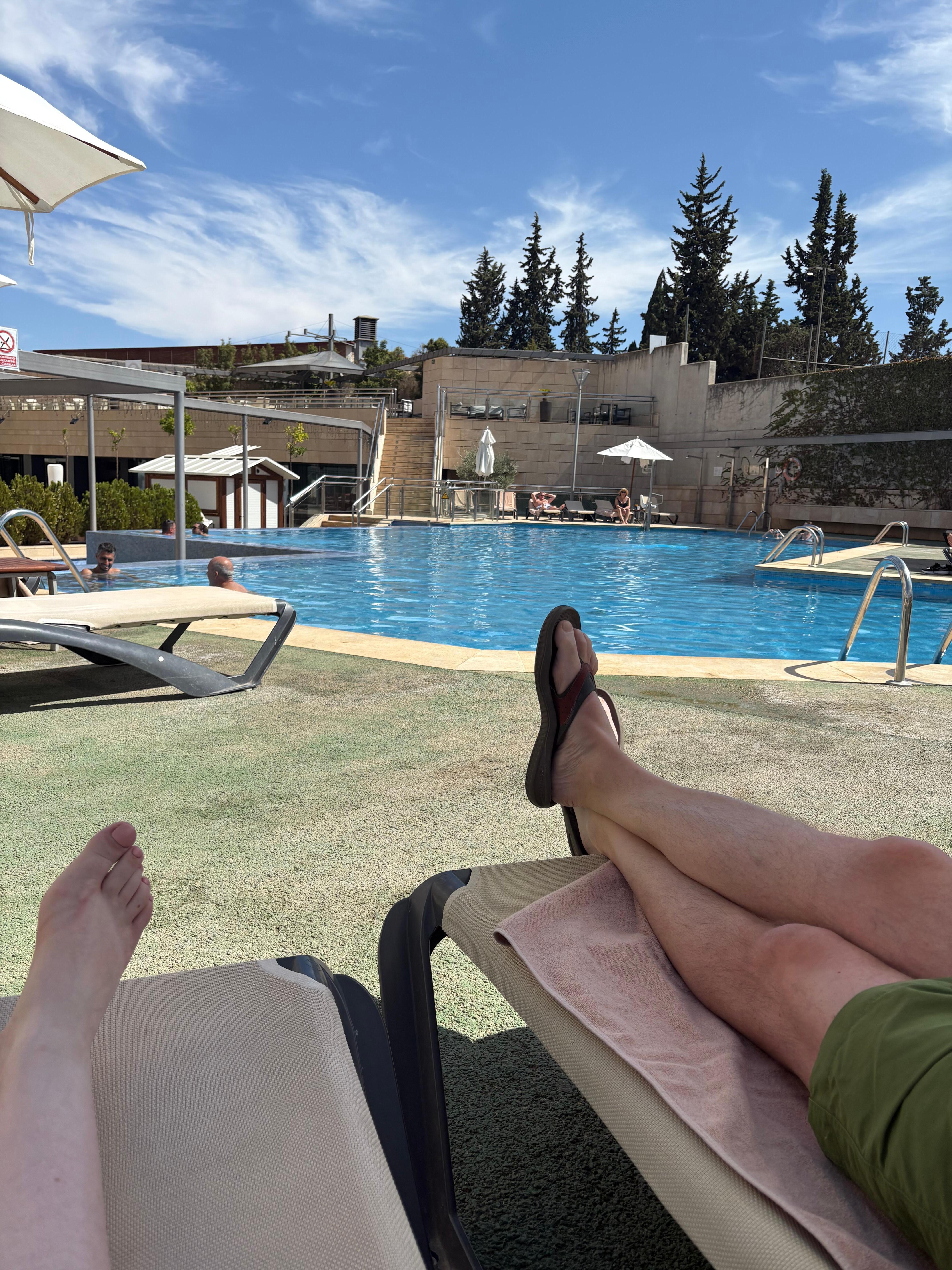 Fabulous pool area with gym and pool bar.