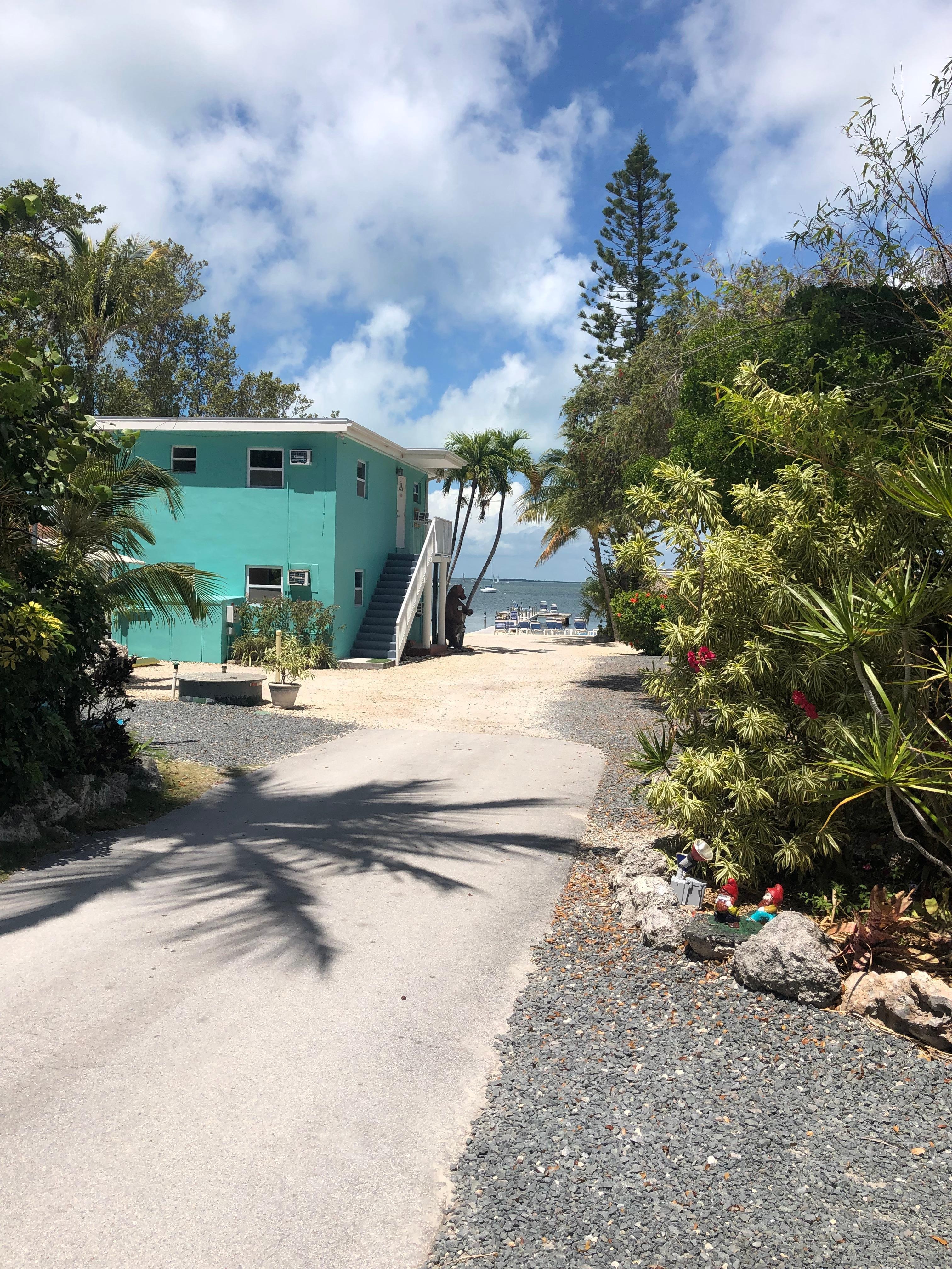 View from our cottage right to the beach! Beautiful sunsets, dolphin swim byes.