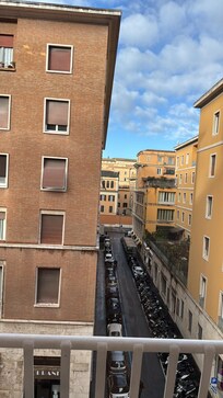 At the end of the street you see already the wall of Vatican City. Picture was taken from the balcony of our room