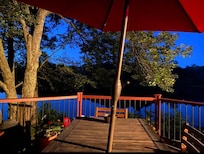 Deck overlooking lake at night