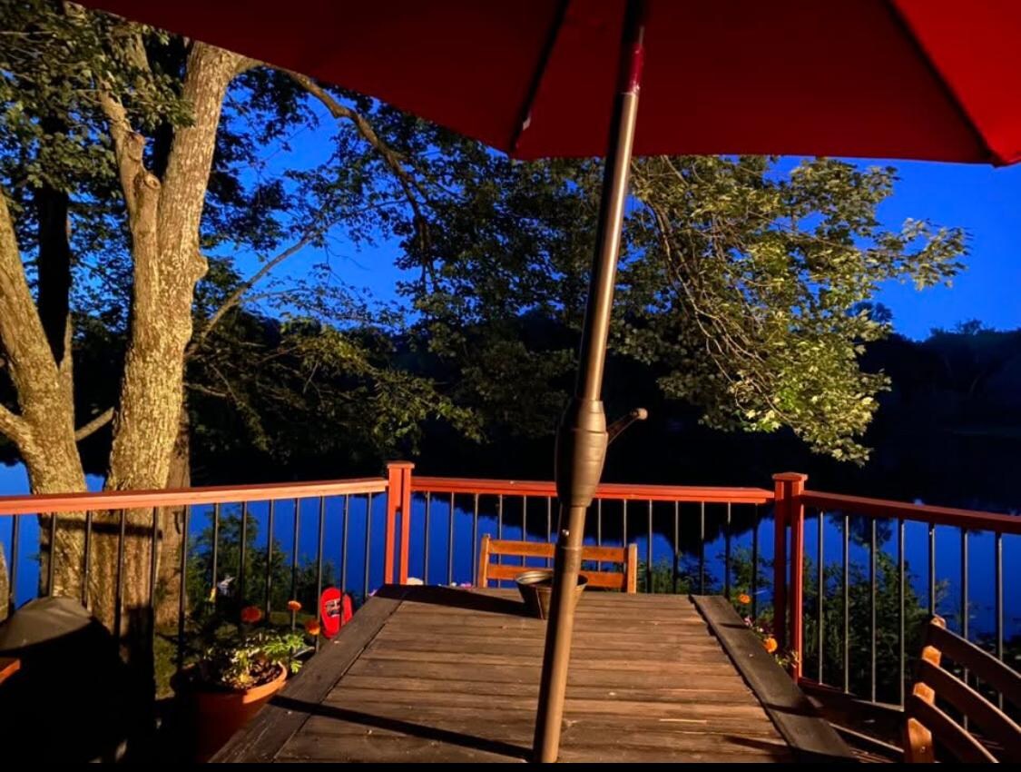 Deck overlooking lake at night