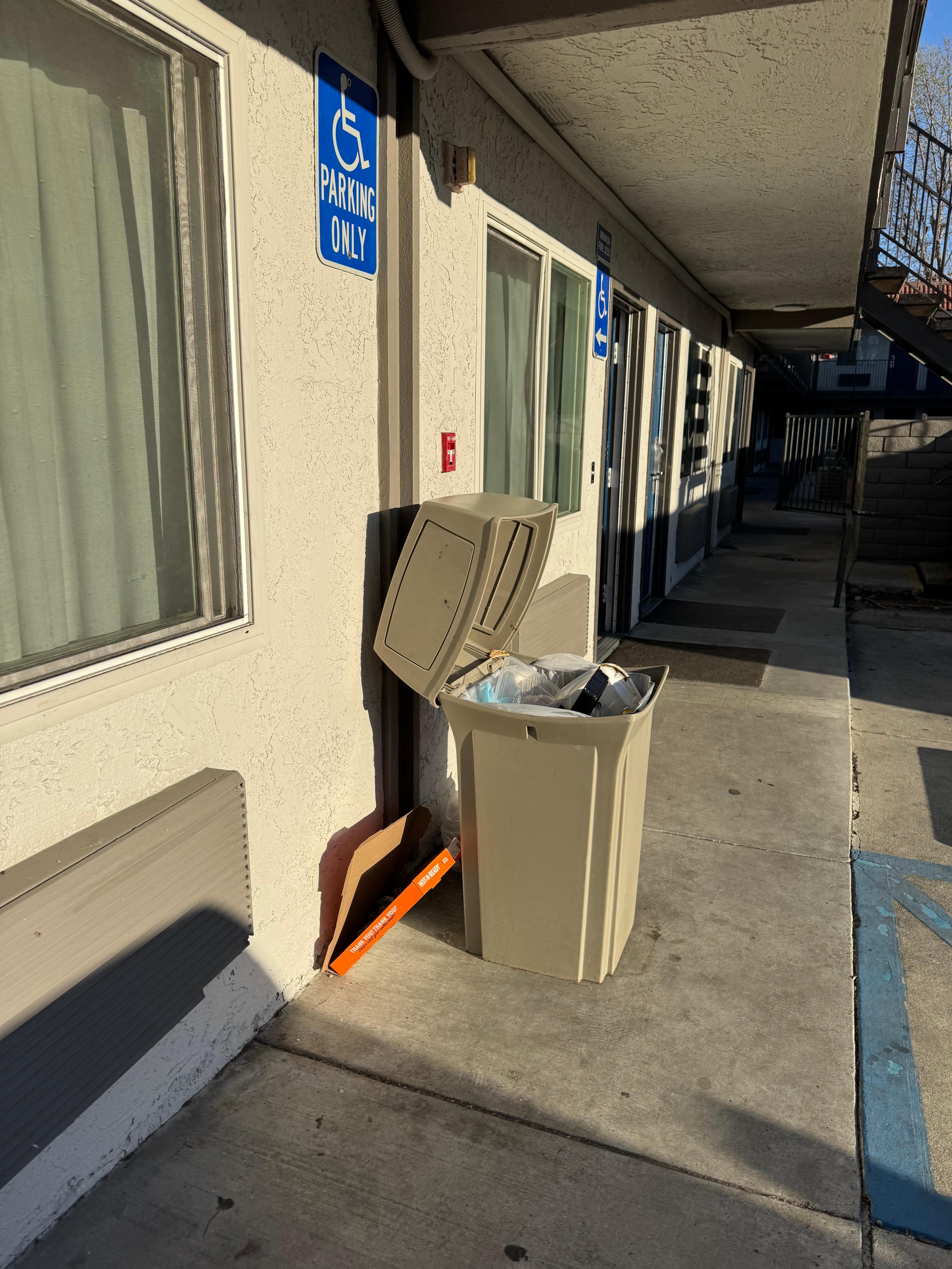 This is right next to my door and window. This is also after I picked up the trash on the ground. 