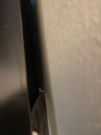 Behind the dresser was wrappers and dirt