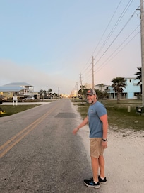 Street behind the house with restaurants close by!