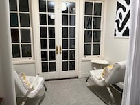 Sitting area leading into the outside patio and garden