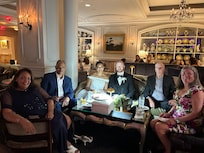 Enjoying a cocktail in the warm atmosphere of the Davenport Lounge