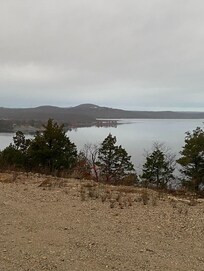 Gravel drive behind properties. We walked it. Beautiful view!