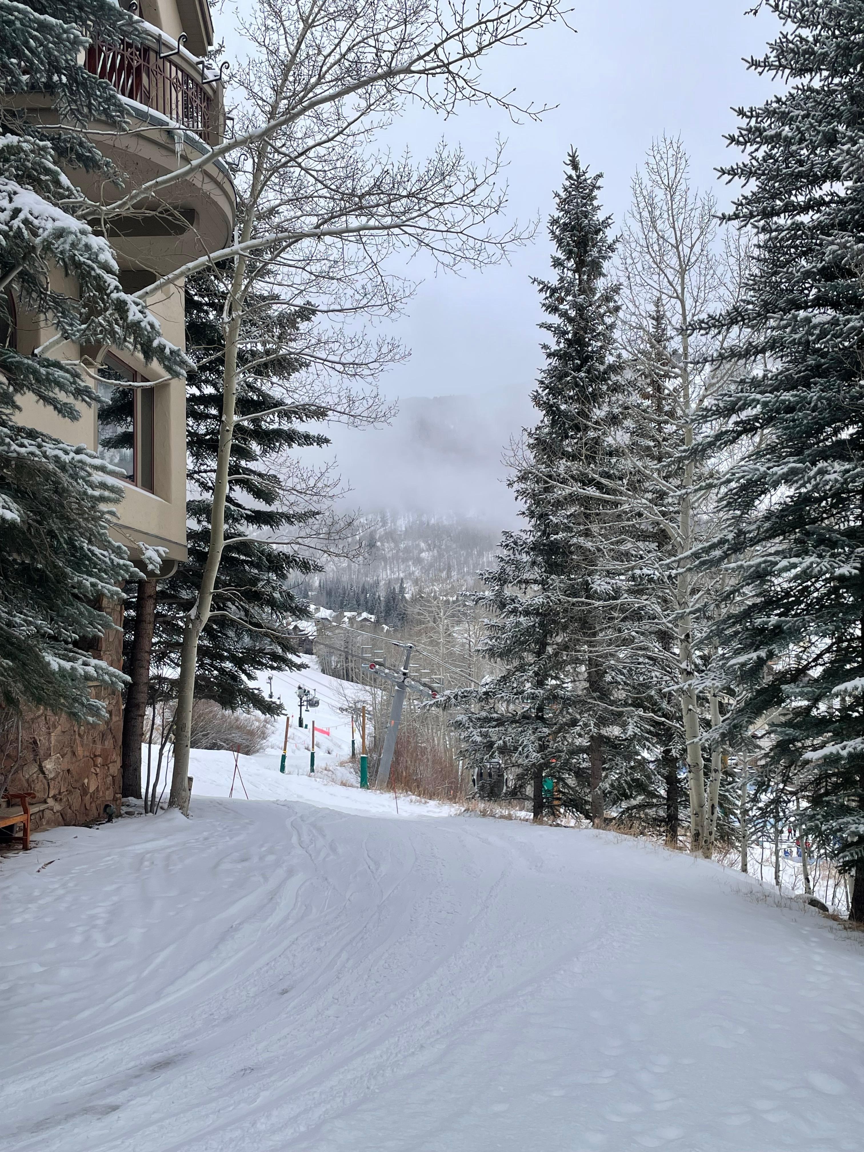 looking downward on the ski way outside the unit-tranquil and easy access in and out-we loved this!