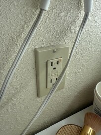 Power outlet with blood splatter