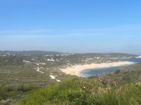 I took this photo walking up to Surfers Point...the studio backs on to heath right next door to the beach below.