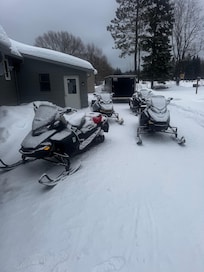 3/4 truck and 26’ trailer in background. Big Driveway!