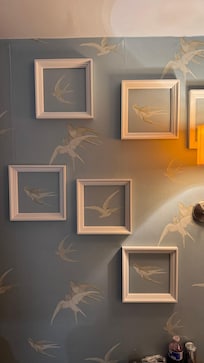 Great idea “framing” the wallpaper! Love it.