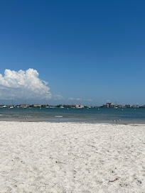 Pretty, quiet beach walkable or short drive with free parking from the house.