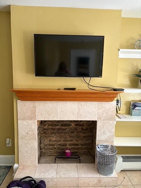 TV is on a swivel arm so can be watched from the bed or the chairs