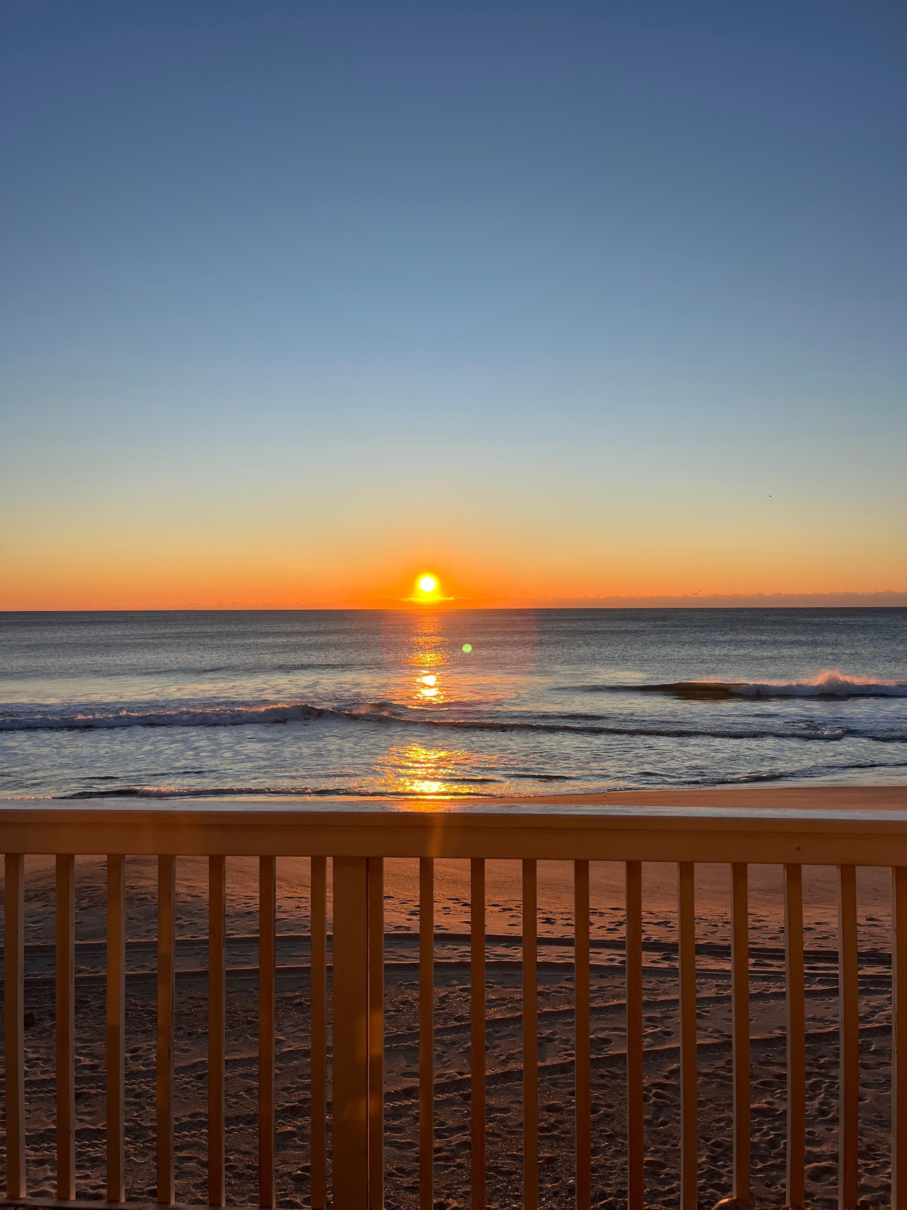 Out the back sliding door on the deck 