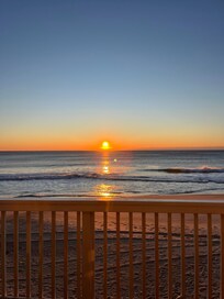 Out the back sliding door on the deck