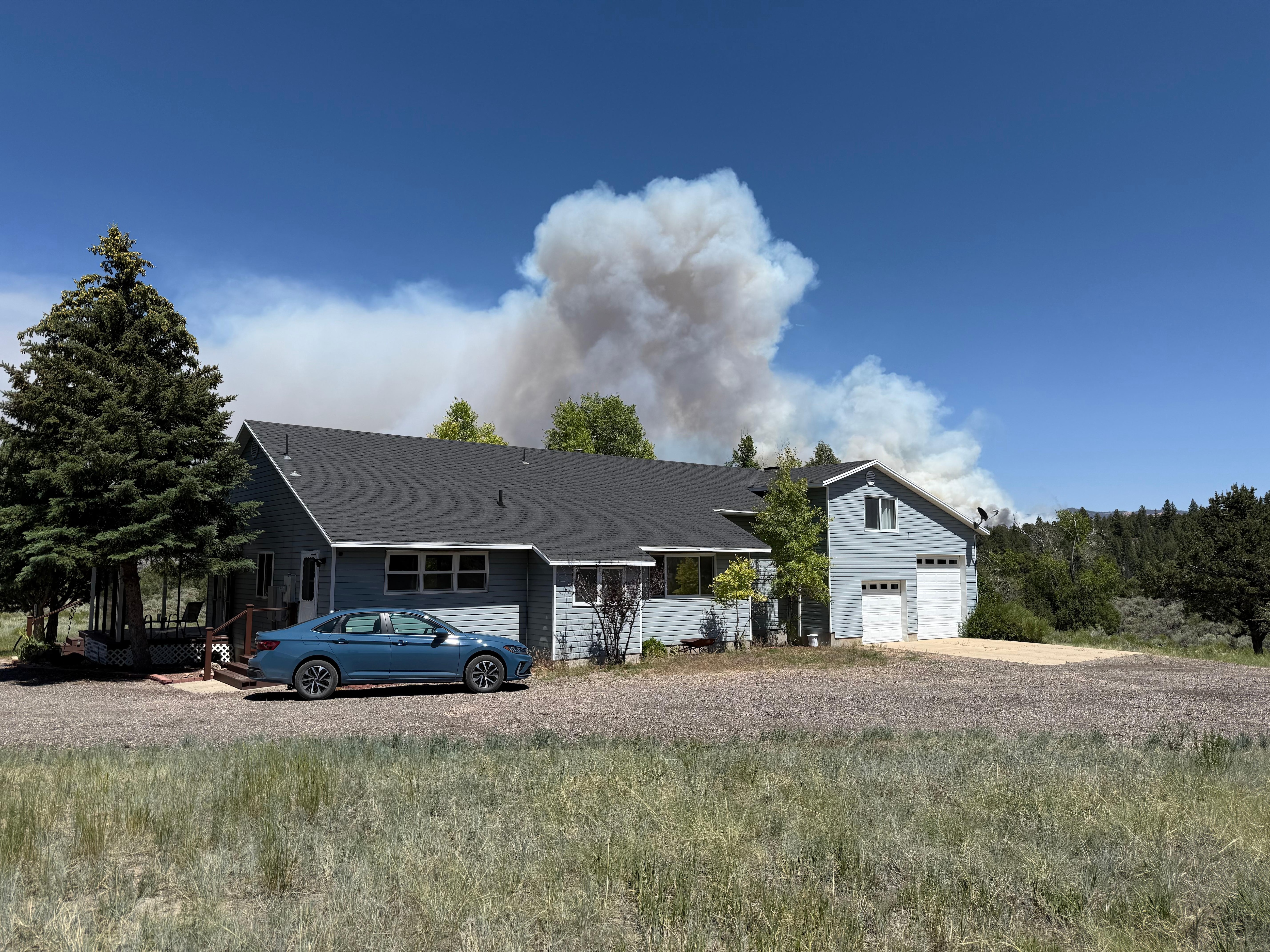 Back side of home and wild fire smoke 