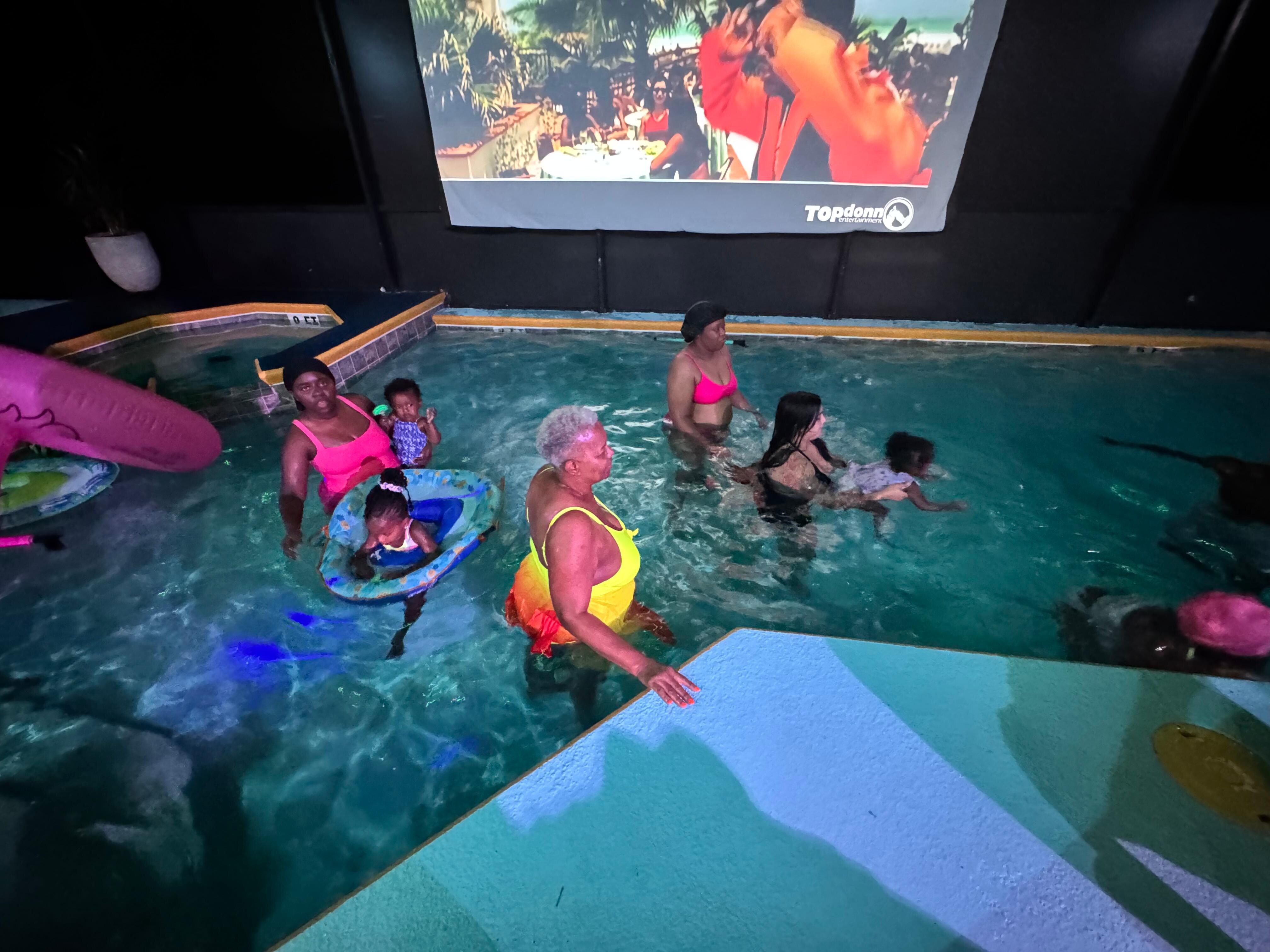 enjoying the pool and projector. 