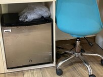 Rusted furniture and refrigerator