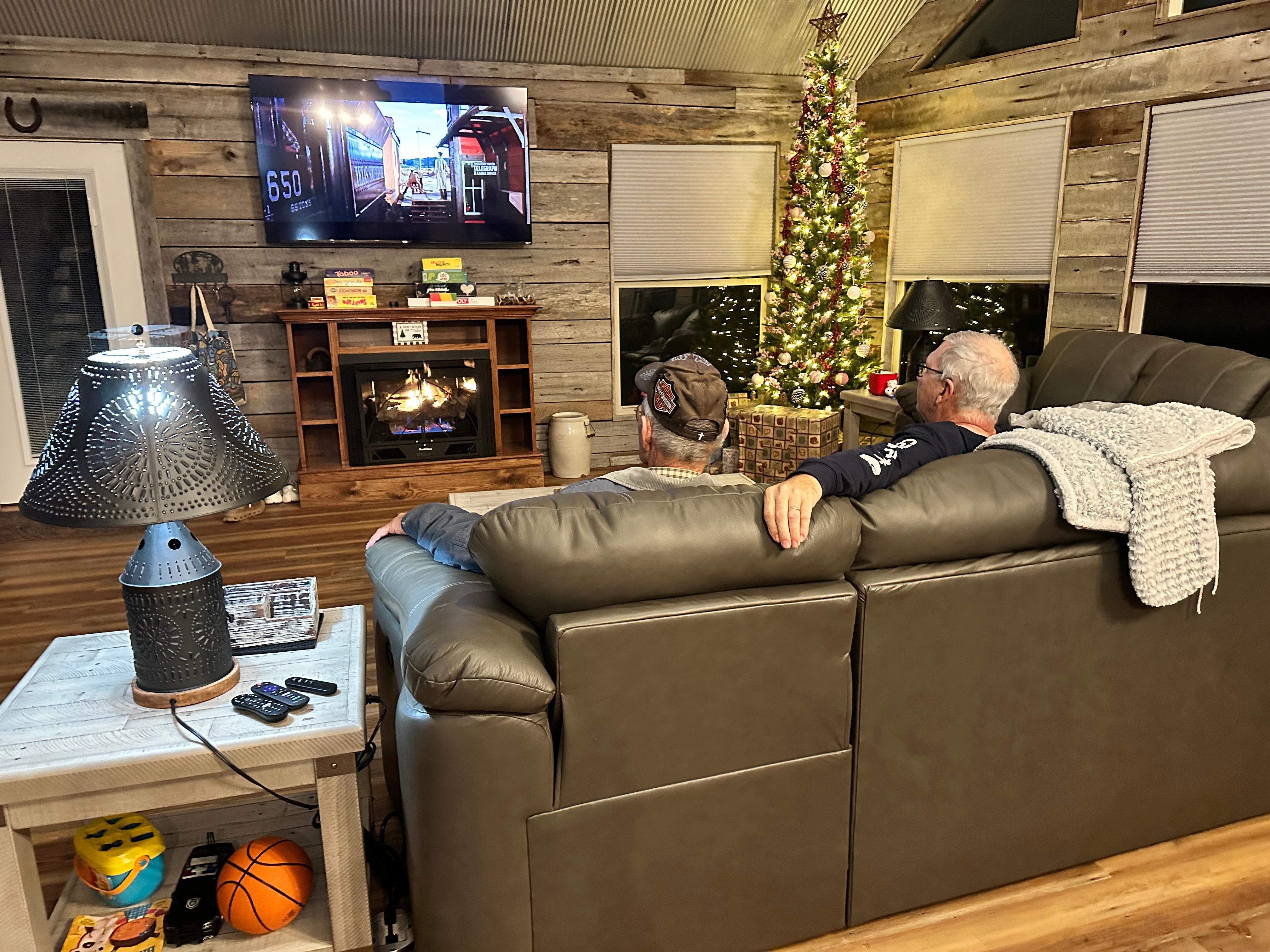 Cozy fireplace and thoughtful extra touch was decorated for Christmas 