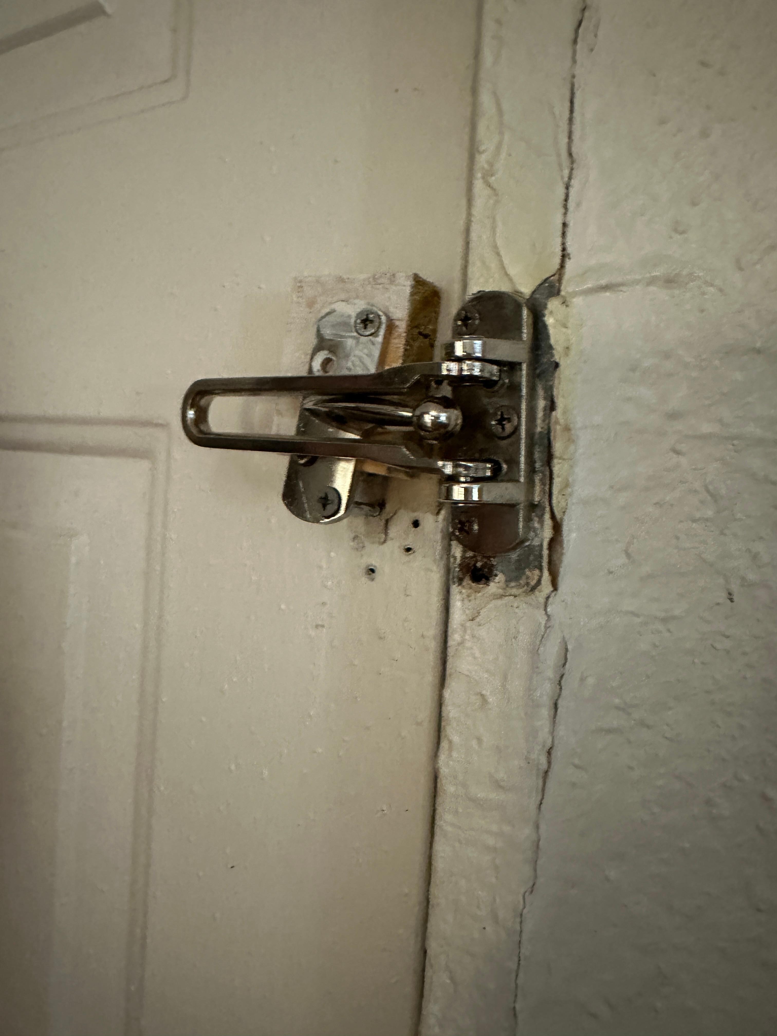 Front door lock not securely installed